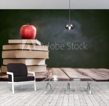 Picture of Apple and pile of books